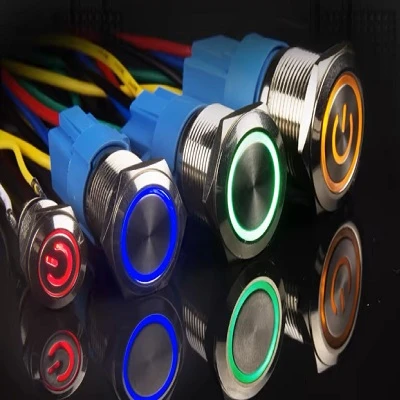 What is the difference between latching and momeary metal push button switches?